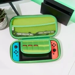 Ghostbusters ‘Slimer’ Case For Nintendo Switch / Switch OLED 9 Ghostbusters ‘Slimer’ Case For Nintendo Switch / Switch OLED -Just Geek Store Slimer Ghostbusters SwitchCase PL 2